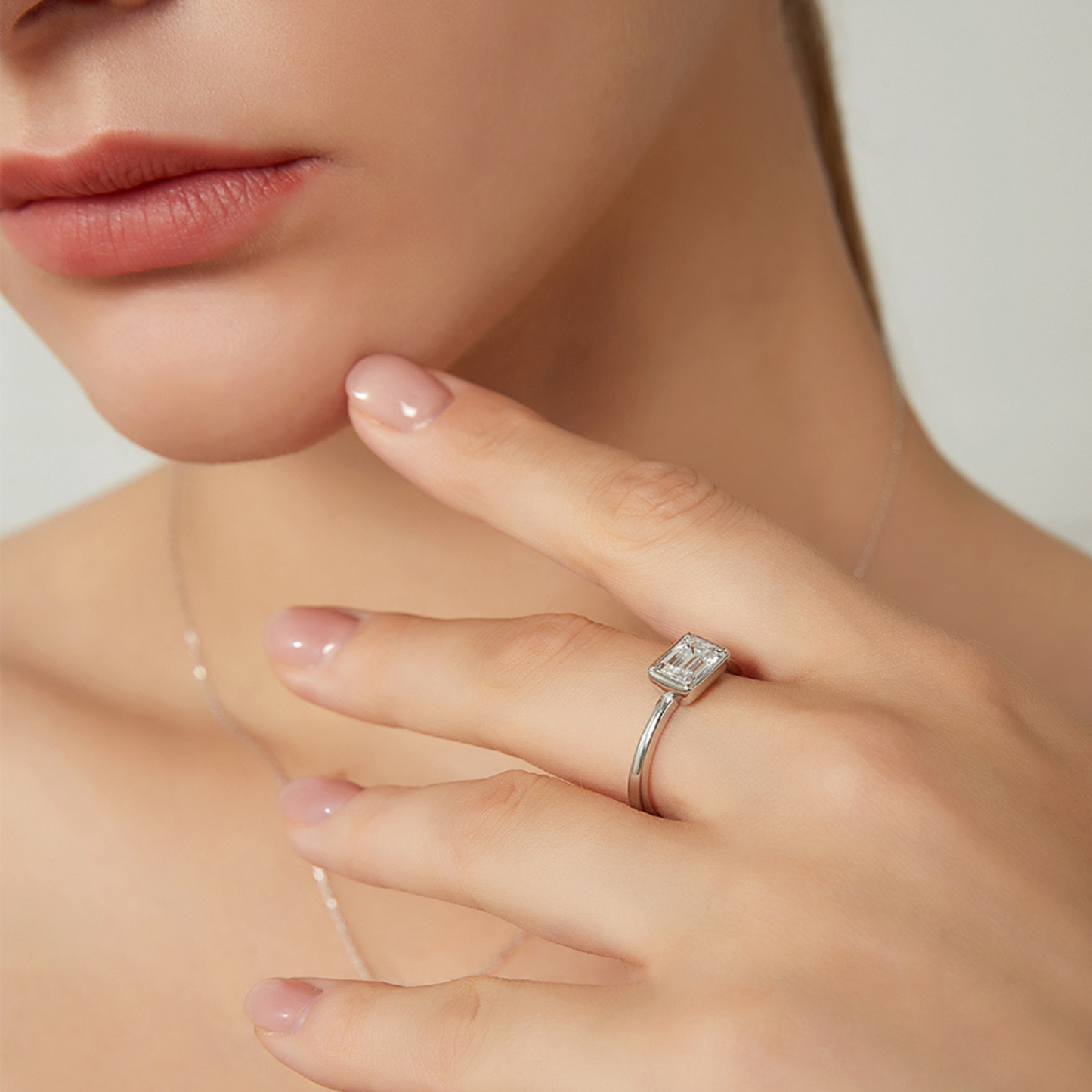 Bezel Set Emerald Cut Moissanite Ring